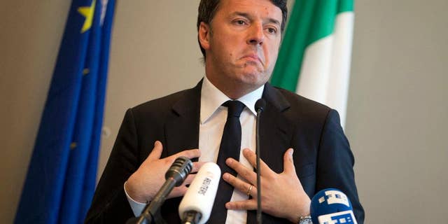 Former Italian Prime Minister Matteo Renzi speaks prior to a conference in Brussels on Friday, April 28, 2017. Renzi is finishing his campaign for the leadership of the Italian Democratic Party in the shadows of the European Union headquarters. (AP Photo/Virginia Mayo)