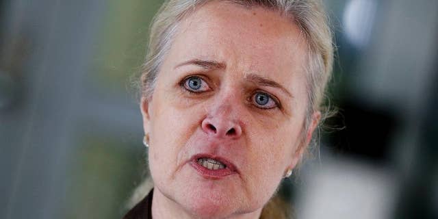 State's attorney Nadja Niesen talks to media people in Frankfurt, Germany, Thursday, April 27, 2017, after police have arrested a German soldier who had posed as a Syrian refugee on suspicion he was planning an attack, apparently motivated by anti-foreigner sentiment, in a case that German prosecutors said Thursday was "more than strange." (AP Photo/Michael Probst)