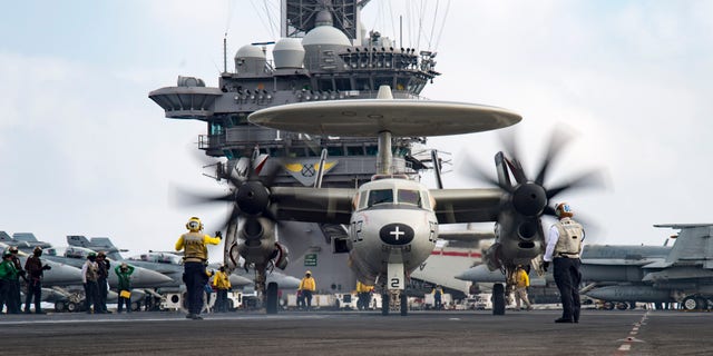 An E2-C Hawkeye on the flight deck of the aircraft carrier USS Dwight D. Eisenhower on June 28, 2016.