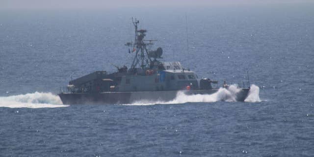Iran's Houdong-class missile boat seen from the USS New Orleans.