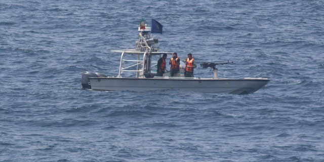 An Iranian patrol boat seen from the USS New Orleans.