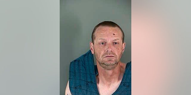 FILE- This undated file photo provided by Lane County Corrections shows Troy Vance Thompson. Thompson, a former firefighter who shot nine 3-inch nails into the back of a woman's head in a botched suicide pact has been sentenced to two years in state prison. (Lane County Corrections via AP, file)