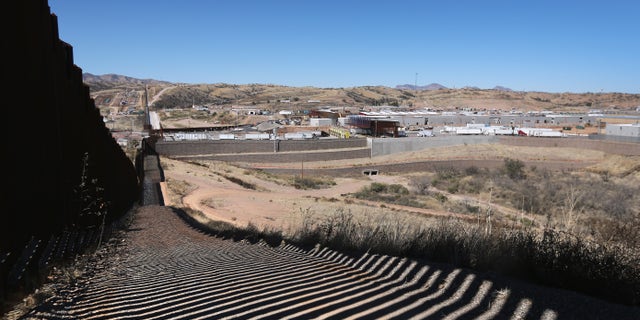 The U.S.-Mexico border stretches into the distance in Nogales, Arizona.