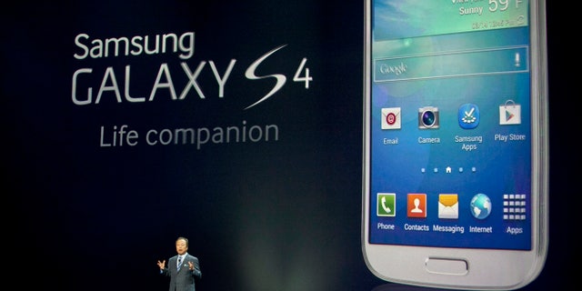 NEW YORK, NY - MARCH 14: JK Shin, President and Head of IT and mobile communication division of Samsung introduces the Samsung Galaxy S IV, March 14, 2013 in New York City. Samsung, the world's largest handset maker, revealed their successor to the Galaxy S III. The Galaxy S IV features a five-inch 1080p screen, a 1.9GHz quad-core processor, a 13-megapixel rear camera and ships with the latest Android version, Jelly Bean. (Photo by Allison Joyce/Getty Images)