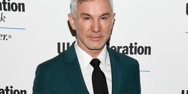 FILE - In this June 16, 2016 file photo, director Baz Luhrmann attends the UJA-Federation of New York's "Music Visionary of the Year Award" luncheon in New York. “Moulin Rouge” director Luhrmann will speak to graduating seniors at Princeton. Princeton’s graduating class chose him as their Class Day speaker next month. The Australian will address graduates and their guests the day before commencement. (Photo by Evan Agostini/Invision/AP, File)