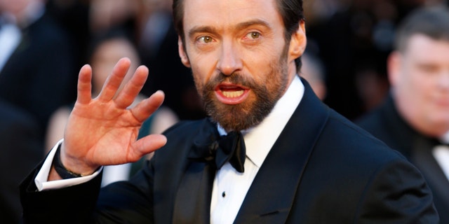 Australian born actor, Hugh Jackman, best actor nominee for his role in "Les Miserables" arrive at the 85th Academy Awards in Hollywood, California on Feb. 24, 2013.