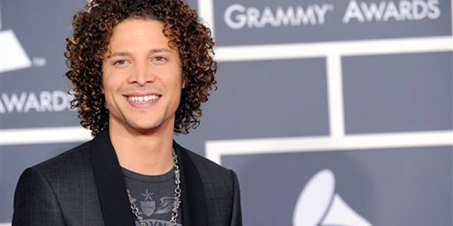Justin Guarini arrives at the Grammy Awards on Sunday, Jan. 31, 2010, in Los Angeles. (AP Photo/Chris Pizzello)