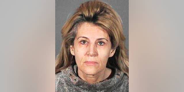 This undated handout booking photo from the Los Angeles County Sheriff shows Dawn DaLuise. DaLuise, 55, was arrested after authorities say she tried to hire someone to kill a business rival she mistakenly thought was behind a cyber-stalking campaign, which included lewd flyers, emails and Craigslist ads with her address seeking men to act out a "rape fantasy." Authorities recently arrested a suspect in the case, which was not the man she sought to have killed. (AP Photo/Los Angeles County Sheriff)