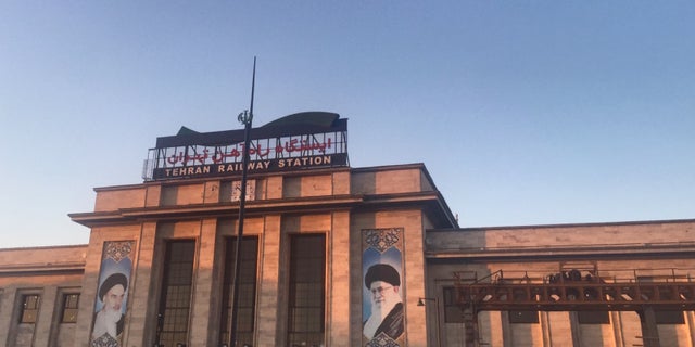 Portraits of Iran’s Supreme Leaders, the late Khomeini and his predecessor Khamenei, adorn landmarks across Iran.