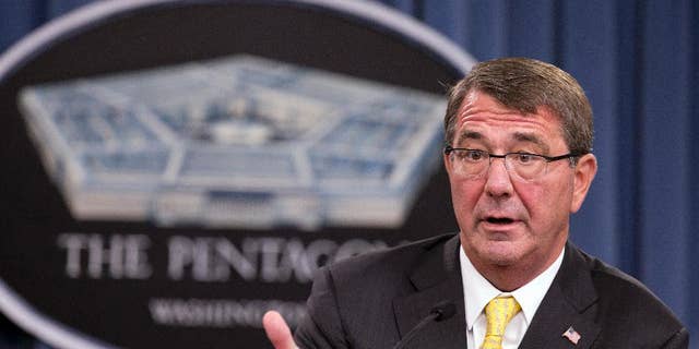 FILE - In this Aug. 20, 2015 file photo, Defense Secretary Ash Carter speaks during a news conference at the Pentagon. Carter spoke with his Russian counterpart Friday, the first step in direct military talks proposed by Russia about Moscow's military buildup to support the Syrian government against the Islamic State group.  (AP Photo/Manuel Balce Ceneta, File)