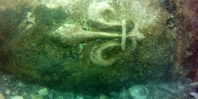 The French fleur-de-lis symbol engraved on a 16th-century bronze cannon discovered in a shipwreck off the coast of Cape Canaveral, in Florida. Credit: Global Marine Exploration, Inc.