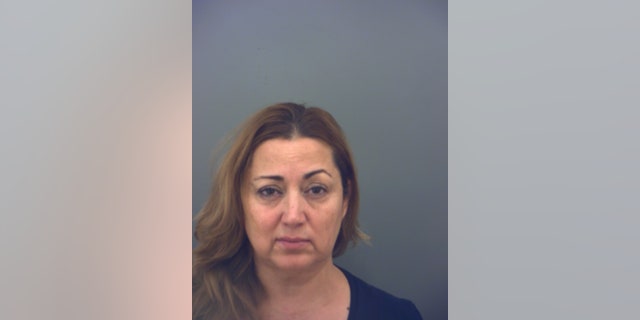 Olga Najera was arrested Monday, accused of slapping a student.