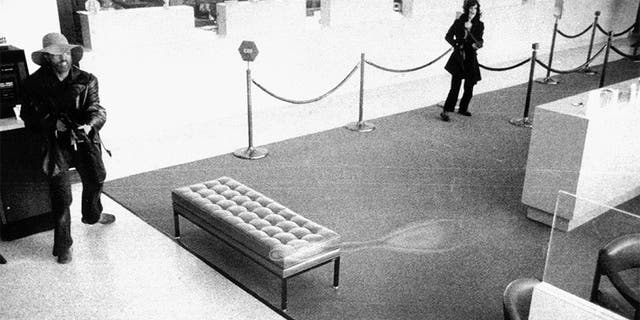 Patty Hearst during the bank robbery in 1974.