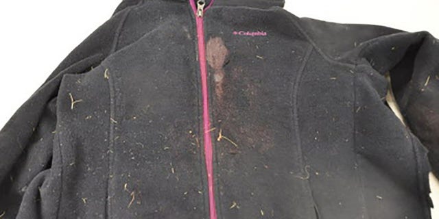 The 12-year-old's coat also had blood and fabric holes from the stabbing.