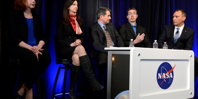 File photo: University of Liege (Belgium) astronomer Michael Gillon (2nd,R) makes remarks as (L-R) Space Telescope Science Institute astronomer Nikole Lewis, MIT Professor of planetary science and physics Sara Seager, Sean Carey of NASA's Spitzer Science Center and Associate Administrator for NASA's Science Mission Directorate Thomas Zurbuchen listen during a news conference, to present new findings on exoplanets, planets that orbit stars other than Earth's sun, in Washington, U.S., February 22, 2017. (REUTERS/Mike Theiler)