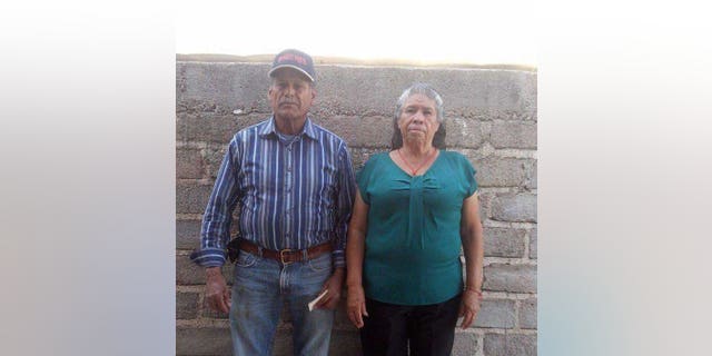 In this photo taken on Dec. 7, 2015, and provided the Esparza family, Jose Isabel Esparza, 69, and his wife, Maria Esparza, 65, pose at their home on a farm in Cuachtemoc, Mexico, west of Mexico City. They have filed a lawsuit in U.S. District Court in Reno, Nevada against the U.S. State Department challenging denial of a visa for Maria to join her husband living and working in Nevada. They have been trying to obtain the visa since 1994. (Esparza Family via AP)