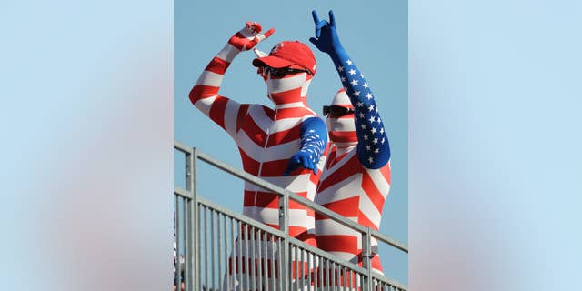 Fans cheer during a four-ball match at the Ryder Cup golf tournament Saturday, Oct. 1, 2016, at Hazeltine National Golf Club in Chaska, Minn. (AP Photo/Charlie Riedel)