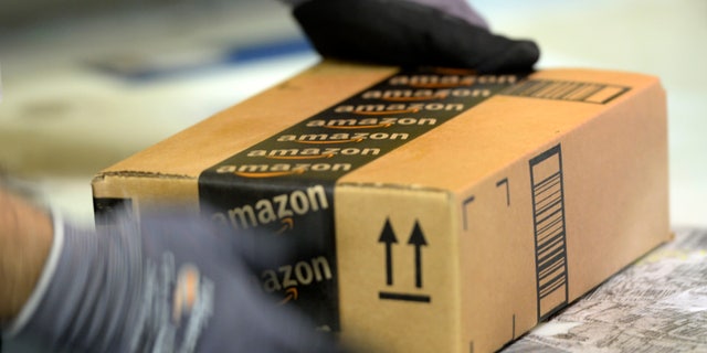 SAN BERNARDINO, OCTOBER 29: An employee prepares order at Amazon's San Bernardino Fulfillment Center October 29, 2013 in San Bernardino, California. Amazon's 1 million-square-foot facility in the economically hard-hit San Bernardino County has created more than 800 jobs at the center. Fulfillment centers are where products sold by other vendors on Amazon.com store their inventory. (Photo by Kevork Djansezian/Getty Images)