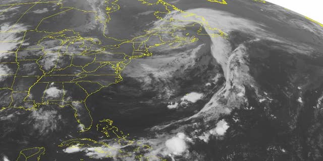 This NOAA satellite image taken Tuesday, June 14, 2016 at 12:45 a.m. EDT shows a strong storm system in Southeastern Canada. Its associated trough is creating some high thin clouds over Northern New England. The rest of region is experiencing isolated thunderstorms. (NOAA/Weather Underground via AP)
