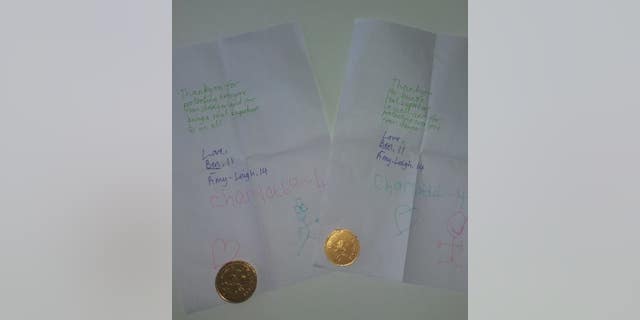 The notes for Manchester police came with chocolate coins.
