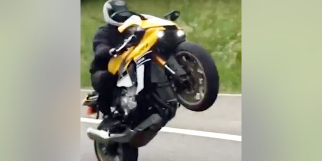 A 26-year-old biker has been jailed after he filmed himself travelling at almost 200MPH - believed to be the highest speed ever clocked by a motorbike on British roads. See NTI story NTISPEED.  Heart-stopping footage shows idiotic Adam Campion hurtling along roads at breakneck speeds while pulling dangerous wheelies and weaving in and out of traffic.  He was also captured in shocking mobile phone clips driving on the wrong side of the road and filming himself hitting a top speed of 189mph on a stolen motorbike.  Police discovered the damning footage when they executed a warrant at Campion's address and recovered his laptop in September 2016.  Officers had earlier found a licence plate in the boot of an abandoned car which was connected to a stolen motorbike linked to Campion.  Campion, of Hucknall, Notts., was jailed for 21-months at Nottingham Crown Court on Wednesday (18/7) after pleading guilty to five counts of dangerous driving.  He also pleaded guilty to assisting an offender in the retention of stolen goods.  The court was told how Campion's laptop was seized, which contained hundreds of videos and images of motorcycles being driver recklessly.  Detectives used forensic facial recognition which identified Campion as the rider - despite him wearing a crash helmet at times.
