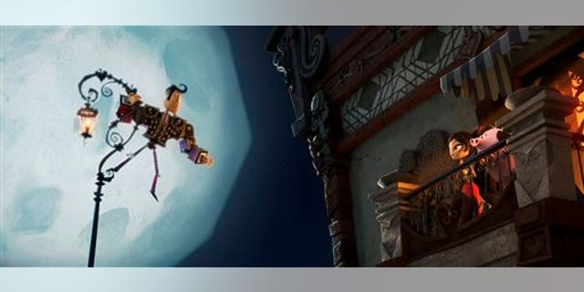 Manolo, left, voiced by Diego Luna, serenading Maria voiced by Zoe Saldana in a scene from 'Book of Life.'