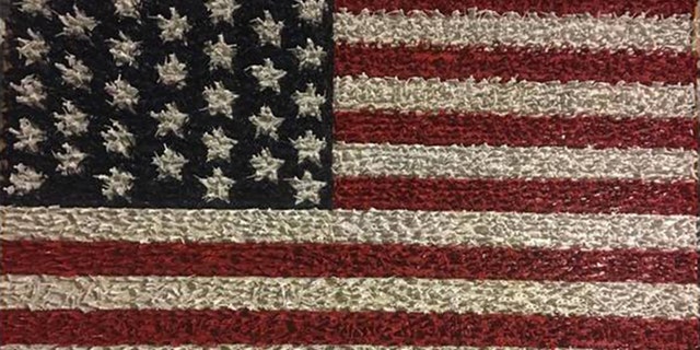 Greg Smith, of LaGrange, Georgia, used more than 10,000 plastic Army men to create an American flag.