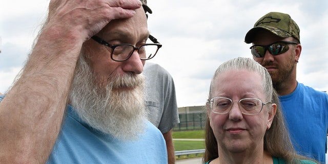 Aug. 13, 2015: Lewis Fogle, pictured with his wife, Deb, becomes emotional after his release from the State Correctional Institution in Pine Grove, Pa. Fogle, who spent 34 years imprisoned for the 1976 murder of a 15-year-old girl, was released after DNA tests proved his was not the person who committed the crime. (Bob Donaldson/Pittsburgh Post-Gazette via AP)