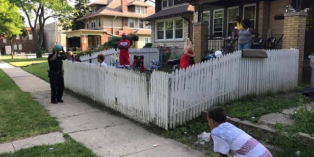 Jordan McClelland and Milwaukee Police Officers playing 'cans.'