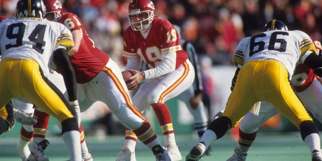 Quarterback Joe Montana #19 of the Kansas City Chiefs drops back to pass against the Pittsburgh Steelers in the 1993 AFC Wild Card Game at Arrowhead Stadium on January 8, 1994 in Kansas City, Missouri. The Chiefs defeated the Steelers 27-24 in overtime. (Photo by Joseph Patronite/Getty Images)