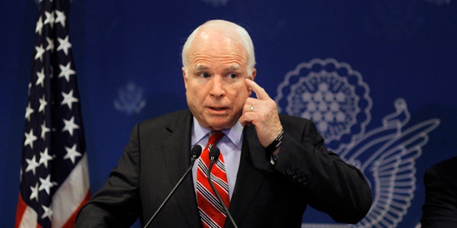 FILE: Aug. 6, 2013: GOP Arizona Sen.John McCain talks at a press conference in Cairo, Egypt.