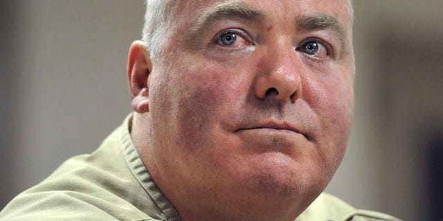 FILE - In this Wednesday, Oct. 24, 2012, file photo, Michael Skakel listens during a parole hearing at McDougall-Walker Correctional Institution in Suffield, Conn. A Connecticut judge is hearing arguments on whether he has the authority to release Kennedy cousin Skakel from prison while he awaits a new trial in the 1975 slaying of neighbor Martha Moxley. (AP Photo/Jessica Hill, Pool, File)
