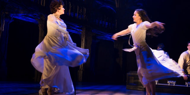 In this undated photo provided by The O & M Company, Chita Rivera, as Claire Zachanassian, left, and Michelle Veintimilla, as young Claire, perform in the Tony Award-nominated musical "The Visit," in New York. (Thom Kaine/The O & M Company via AP)