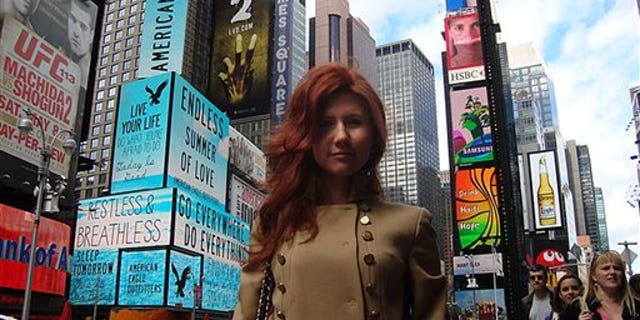 This undated image taken from the Russian social networking website "Odnoklassniki", or Classmates, shows a woman journalists have identified as Anna Chapman, who appeared at a hearing Monday, June 28, 2010 in New York federal court. Chapman, along with 10 others, was arrested on charges of conspiracy to act as an agent of a foreign government without notifying the U.S. attorney general. The caption on Odnoklassniki reads "Russia, Moscow. Left 4 dead???" (AP Photo)