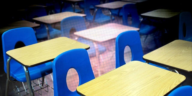 Classroom desks used at Decker College await auction Friday, Feb. 10, 2006 at the site of the former school in Louisville, Ky. Decker, a for-profit trade school run by former Massachusetts Gov. William Weld, is now closed, mired in bankruptcy proceedings and under FBI investigation in a case that has cast a long shadow over Weld's bid to become the next governor of New York. (AP Photo/Brian Bohannon)