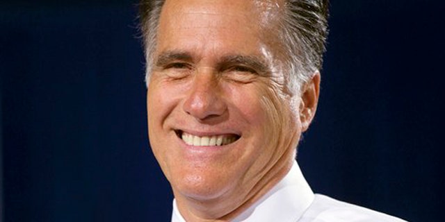 Republican presidential candidate, former Massachusetts Gov. Mitt Romney smiles during a campaign stop on Wednesday, July 18, 2012 in Bowling Green, Ohio. (AP Photo/Evan Vucci)