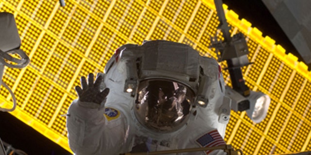 S128-E-007035 (1 Sept. 2009) --- Astronaut Nicole Stott, Expedition 20 flight engineer, participates in the STS-128 mission's first session of extravehicular activity (EVA) as construction and maintenance continue on the International Space Station. During the six-hour, 35-minute spacewalk, Stott and astronaut John "Danny" Olivas (out of frame), mission specialist, removed an empty ammonia tank from the station's truss and temporarily stowed it on the station's robotic arm. Olivas and Stott also retrieved the European Technology Exposure Facility (EuTEF) and Materials International Space Station Experiment (MISSE) from the Columbus laboratory module and installed them on Discovery's payload bay for return.