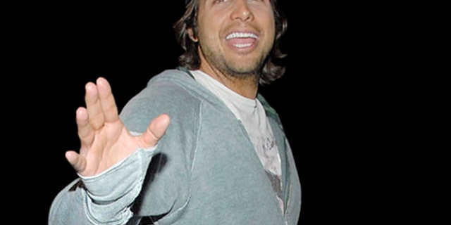 ** FILE ** Producer of "Girls Gone Wild" Joe Francis waves to fans and the press at the Los Angeles International Airport in Los Angeles in this March 12, 2008, file photo. (AP Photo/Dan Steinberg, file)