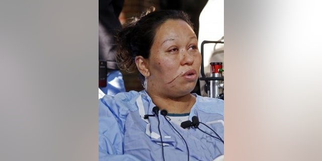 Maria Gurrolla, seen at a news conference on Sept. 30, awaits a judge's ruling on when she will be reunited with her four children.