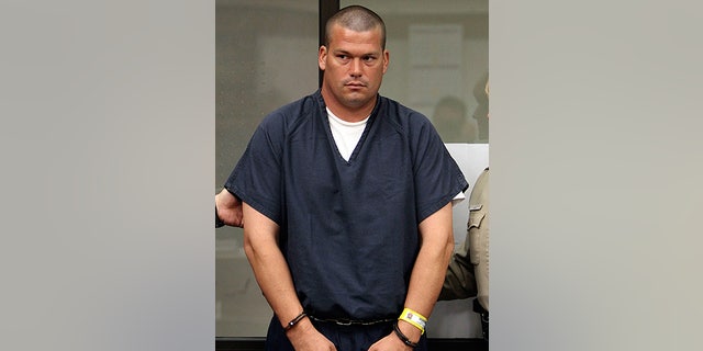 Mar. 3: John Albert Gardner III is escorted by sheriff deputies as he glances toward the judge at an arraignment in San Diego.