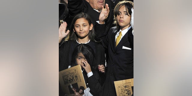 July 7: Michael Jackson's daughter Paris and two sons Prince Michael II (Blanket) and Prince Michael at the singer's memorial in L.A.