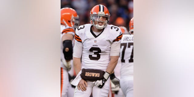 Cleveland Browns quarterback Brandon Weeden (3) reacts after being injured on a sack by the Denver Broncos in the third quarter of an NFL football game, Sunday, Dec. 23, 2012, in Denver. (AP Photo/Joe Mahoney)