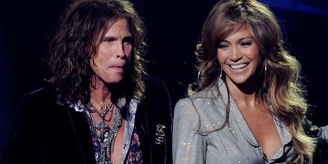 at a press conference to officially announce the season 10 "American Idol" judges panel at The Forum on September 22, 2010 in Inglewood, California.