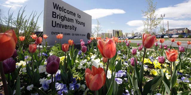 FILE - This April 19, 2016, file photo, shows a welcome sign to Brigham Young University in Provo, Utah.