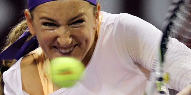 Belarus' Victoria Azarenka returns the ball to Serena Williams of the U.S, in the final match of Qatar WTA Ladies Open tennis tournament in Doha, Qatar, Sunday, Feb. 17, 2013. (AP Photo/Osama Faisal)