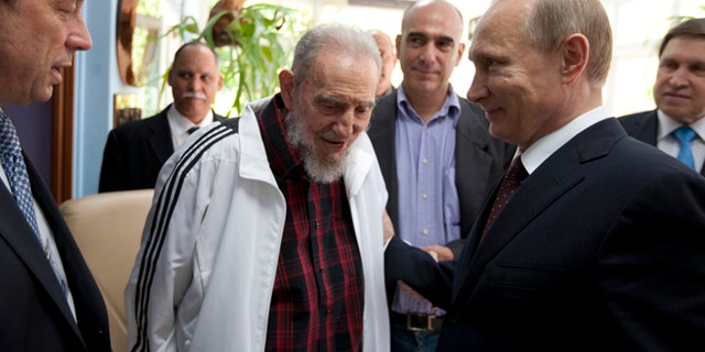 The late Cuban leader, Fidel Castro, meets with Russian President Vladimir Putin in Havana, Cuba, during a visit by the Russian president in 2014. (AP Photo/Alex Castro)