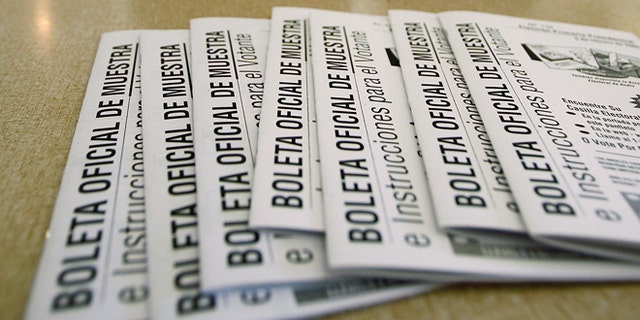 LOS ANGELES, CA - FEBRUARY 05: Voters mark their ballots near Spanish language sample ballots as voters go to the polls for Super Tuesday primaries in the predominantly Latino neighborhood of Boyle Heights on February 5, 2008 in Los Angeles, California. Latinos are an increasingly important factor in California where they are expected to account for 14 percent of the vote and tend to favor presidential hopeful Sen. Hillary Clinton (D-NY) over rival Sen. Barack Obama (D-IL). At 44 million, Latinos make up15 percent of the US population, the nation's largest minority group according to the latest Census Bureau estimates. (Photo by David McNew/Getty Images)