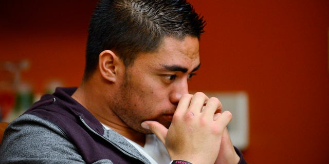 In a photo provided by ESPN, Notre Dame linebacker Manti Te'o pauses during an interview with ESPN on Friday, Jan. 18, 2013, in Bradenton, Fla. ESPN says Te'o maintains he was never involved in creating the dead girlfriend hoax. He said in the off-camera interview: "When they hear the facts they'll know. They'll know there is no way I could be a part of this." (AP Photo/ESPN Images, Ryan Jones) MANDATORY CREDIT