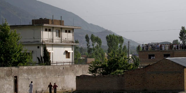 A Pakistan army helicopter heads back after flying over the compound where Al Qaeda leader Usama bin Laden was killed in 2011. (AP Photo/Anjum Naveed)