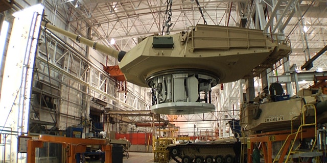 FILE - This undated file photo provided by the General Dynamics Land System shows the production of an Abrams tank in Lima, Ohio. The U.S. decision to suspend delivery of tanks, helicopters and fighter jets to Egypt is more of a symbolic slap than a punishing wound to the military-backed government for its slow slog toward a return to democratic rule. (AP Photo/General Dynamics Land System, File)